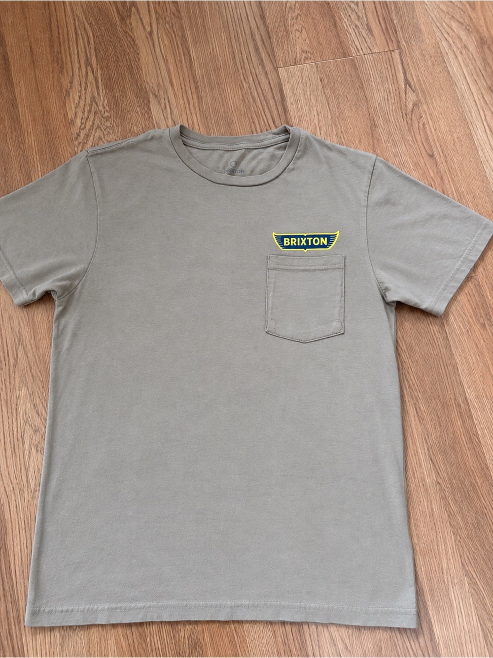 Brixton Short Sleeve Pocket Tee in Olive Green with Yellow Logo